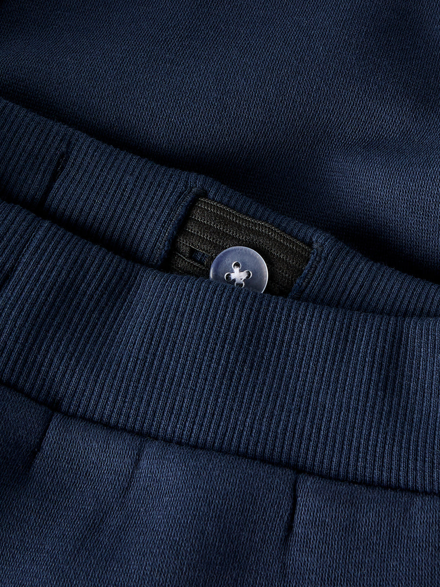 Name It - Luomupuuvillaiset collegehousut - leijona